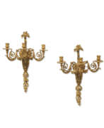 Applique murale. A PAIR OF RESTAURATION ORMOLU AND PATINATED-BRONZE THREE-BRANCH WALL-LIGHTS
