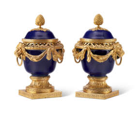 A PAIR OF FRENCH ORMOLU-MOUNTED SEVRES COBALT BLUE-GROUND PORCELAIN POTPOURRI VASES AND COVERS (&#39;VASES DULAC&#39;)
