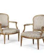 Sessel. A PAIR OF LATE LOUIS XV GILTWOOD FAUTEUILS