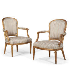 A PAIR OF LATE LOUIS XV GILTWOOD FAUTEUILS