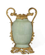 Vases and vessels. AN ORMOLU-MOUNTED CHINESE CELADON VASE