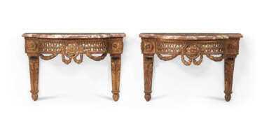A PAIR OF LOUIS XVI GILTWOOD HANGING CONSOLES