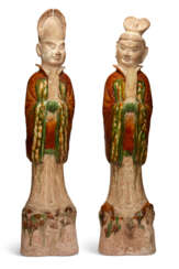 A PAIR OF LARGE CHINESE SANCAI-GLAZED POTTERY FIGURES OF STANDING COURT OFFICIALS