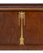 Dresser. A CONSULAT ORMOLU-MOUNTED MAHOGANY COMMODE A VANTAUX