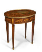 Marketerie. A NORTH ITALIAN ORMOLU-MOUNTED MAHOGANY, WALNUT, AMARANTH, FRUITWOOD AND MARQUETRY OVAL TABLE