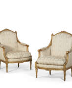 Armchairs. A PAIR OF LOUIS XVI GILTWOOD BERGERES