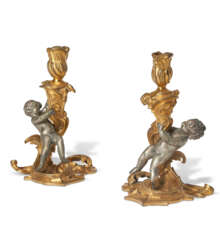A PAIR OF LOUIS XV ORMOLU AND SILVERED-BRONZE CANDLESTICKS