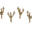 AN ASSEMBLED SET OF FOUR FRENCH ORMOLU TWO-BRANCH WALL LIGHTS - Archives des enchères