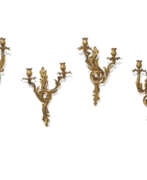 Wall light. AN ASSEMBLED SET OF FOUR FRENCH ORMOLU TWO-BRANCH WALL LIGHTS
