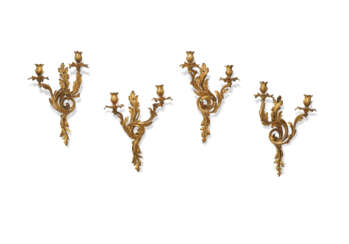 AN ASSEMBLED SET OF FOUR FRENCH ORMOLU TWO-BRANCH WALL LIGHTS