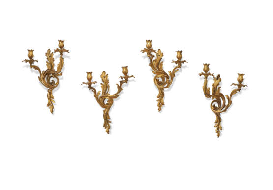 AN ASSEMBLED SET OF FOUR FRENCH ORMOLU TWO-BRANCH WALL LIGHTS - фото 1