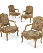 Seat furniture. A SET OF FOUR LOUIS XV GILTWOOD FAUTEUILS