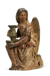 A POLYCHROME-DECORATED TERRACOTTA FIGURE OF A SEATED ANGEL HOLDING AN URN