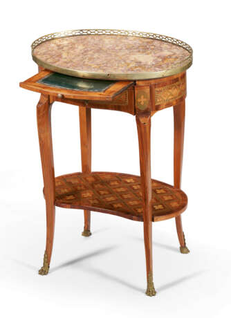 A LOUIS XVI ORMOLU-MOUNTED TULIPWOOD AND PARQUETRY TABLE EN CHIFFONNIERE - photo 3