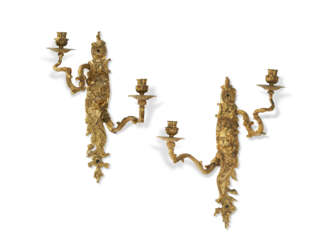 A PAIR OF REGENCE LACQUERED BRONZE TWO-LIGHT WALL LIGHTS