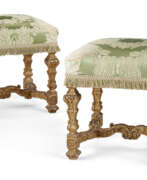 Chairs. A PAIR OF LOUIS XIV GILT-WALNUT TABOURETS