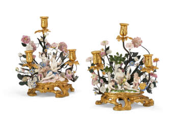 A PAIR OF LOUIS XV ORMOLU AND TOLE-MOUNTED FRENCH AND MEISSEN PORCELAIN THREE-BRANCH CANDELABRA