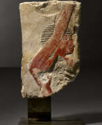 Limestone. AN EGYPTIAN PAINTED LIMESTONE RELIEF FRAGMENT