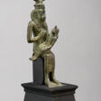 AN EGYPTIAN BRONZE ISIS AND HORUS - Auction archive
