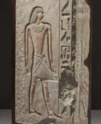 Old Kingdom. AN EGYPTIAN PAINTED LIMESTONE RELIEF FRAGMENT
