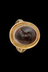 A ROMAN SARDONYX RINGSTONE WITH A HORSE