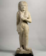 Statue. AN EGYPTIAN LIMESTONE ISIS
