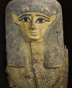 Wood. AN EGYPTIAN PAINTED WOOD COFFIN LID