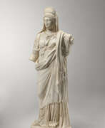 Statue. A ROMAN MARBLE DRAPED JUNO