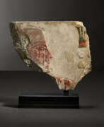 Kalkstein. AN EGYPTIAN PAINTED LIMESTONE RELIEF FRAGMENT