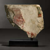 AN EGYPTIAN PAINTED LIMESTONE RELIEF FRAGMENT - фото 1
