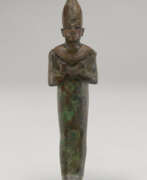 Statue. AN EGYPTIAN BRONZE OSIRIS
