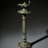 A LARGE AND IMPRESSIVE KHORASSAN BRONZE LAMPSTAND WITH OIL LAMP - фото 1