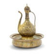 AN OTTOMAN GILT-COPPER (TOMBAK) EWER AND BASIN - Auction archive
