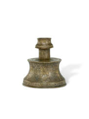 A SIIRT SILVER-INLAID BRONZE CANDLESTICK