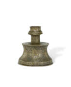 Turquie. A SIIRT SILVER-INLAID BRONZE CANDLESTICK