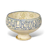 A KASHAN MOULDED LUSTRE AND BLUE POTTERY BOWL - фото 1