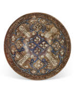 Dynastie seldjoukide. A KASHAN COBALT-BLUE AND LUSTRE POTTERY BOWL