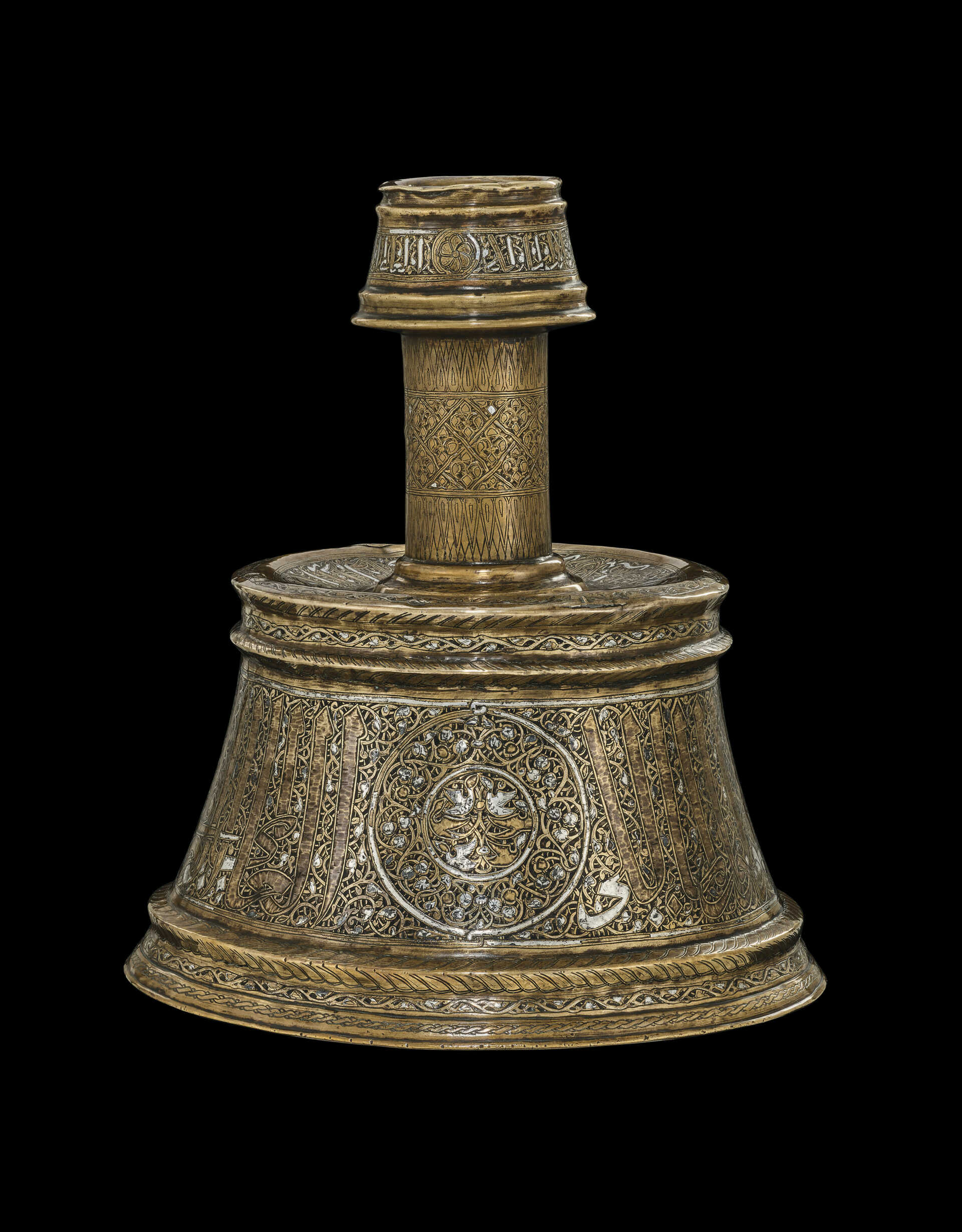 A LARGE MAMLUK SILVER-INLAID BRASS CANDLESTICK