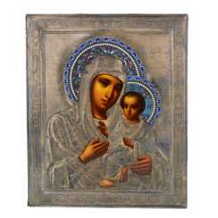 Icon of the Tikhvin Most Holy Theotokos in a silver frame and with cloisonné enamel. 1899-1908
