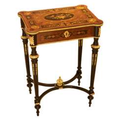 A lovely inlaid wood dressing table with gilded bronze. France late 19th century.