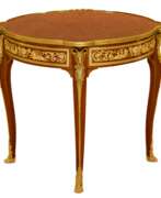 Tables. Mahogany table decorated with marquetry in the style of Louis XV, Francois Linke. Late 19th century