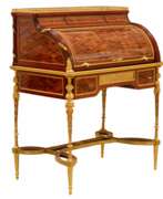 Столы. E.KAHN. Великолепное, цилиндрическое бюро из красного и атласного дерева с золоченой бронзой.