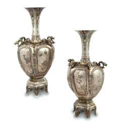 A pair of elegant Japanese vases made of silver and enamel. The turn of the 19th-20th centuries.