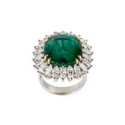 White gold ring with emerald and diamonds.