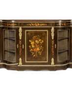 Kommoden. Three-door chest of drawers in Napoleon III style.