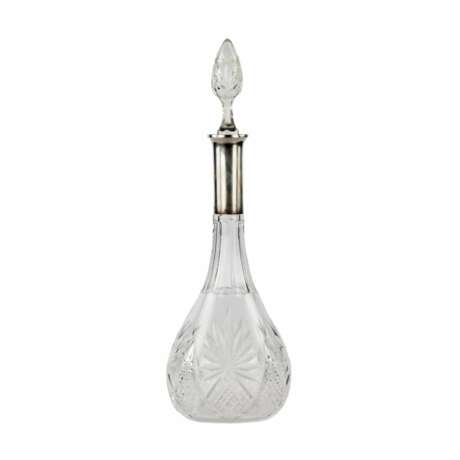 Crystal decanter with a silver neck. - photo 1