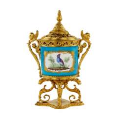 Bronze gilded aroma box with porcelain inlay in the Sevres style. The end of the 19th century
