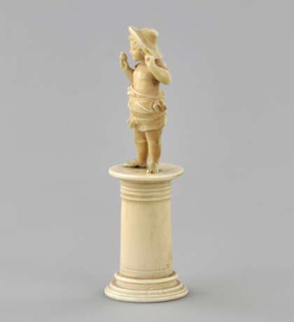 Carved ivory figurine of a boy with a bird 1800s. - photo 4