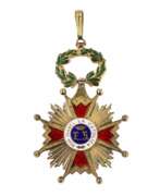 Medaillen. Badge of the Spanish Order of Isabella the Catholic, second class.