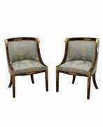 Seat furniture. Pair of armchairs in the Empire style.